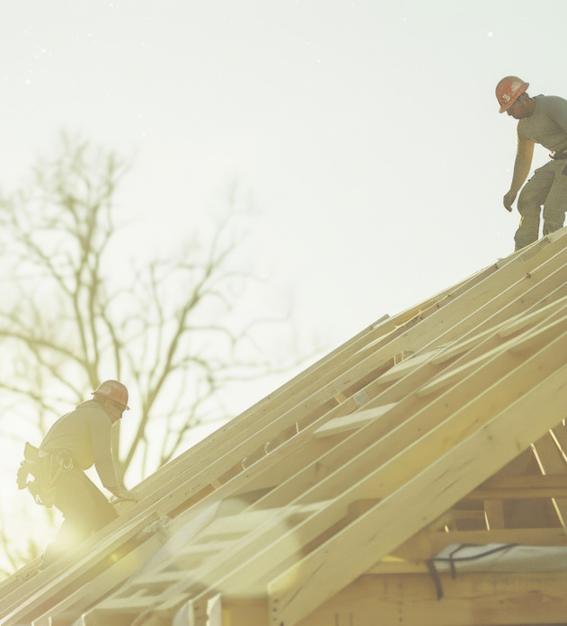 Construction Crew Working Roof Sheeting New Two Story