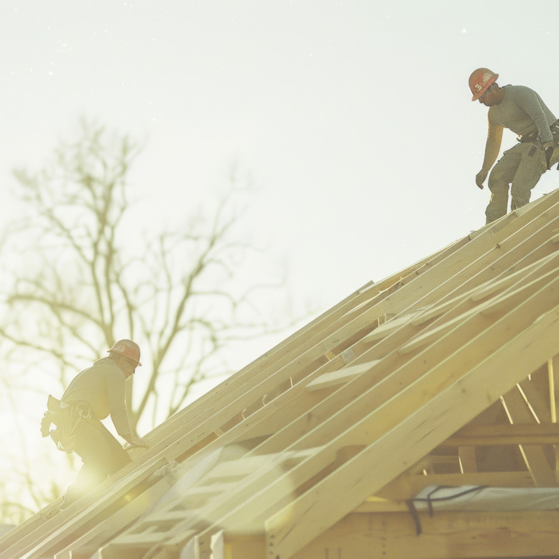 Construction Crew Working Roof Sheeting New Two Story